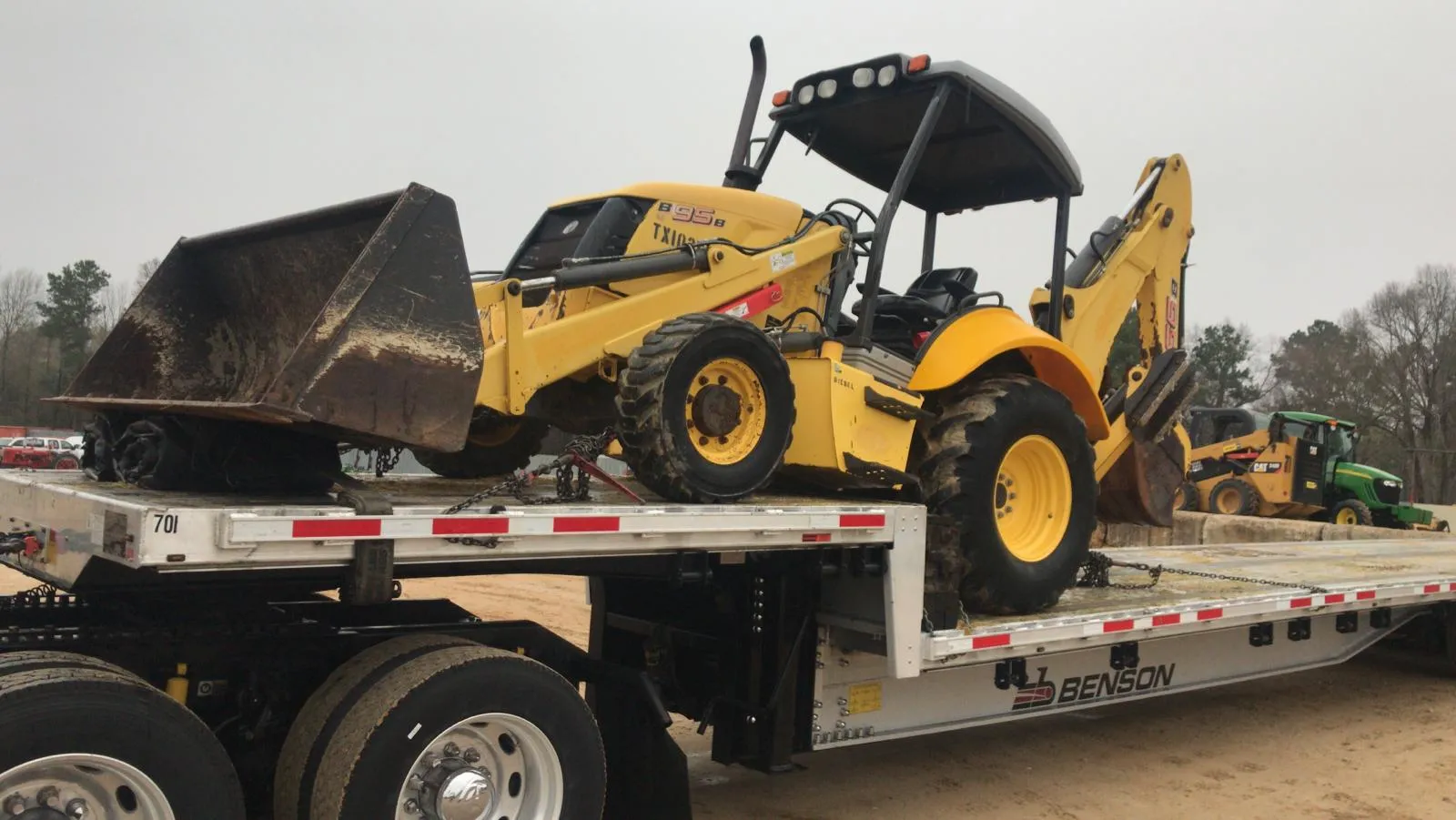 Backhoe transport in San Antonio